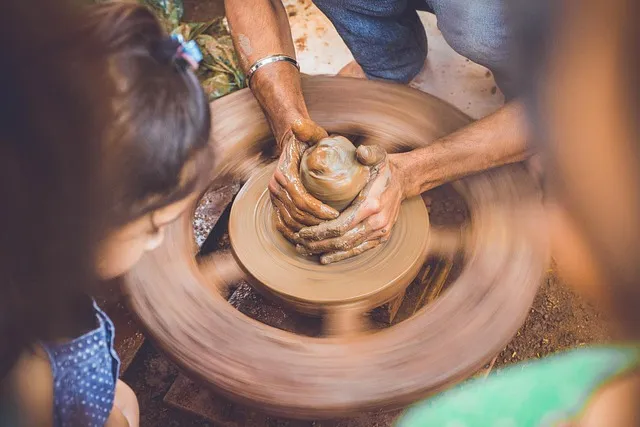 Hands shaping soap by hand in the Rosella studio