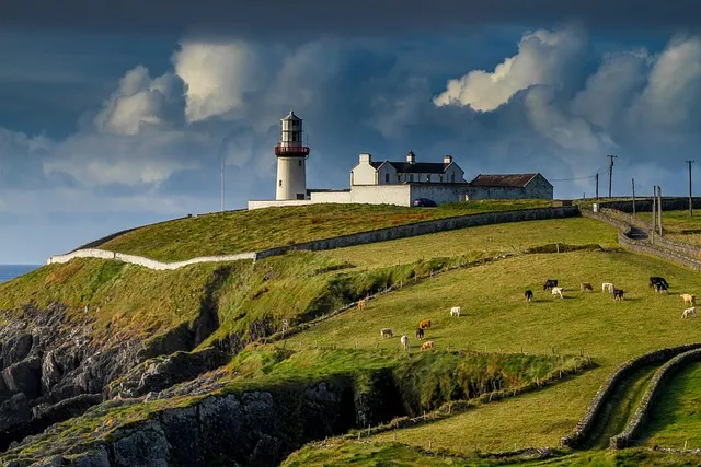 Coastal road and lighthouse on the west coast of Ireland
